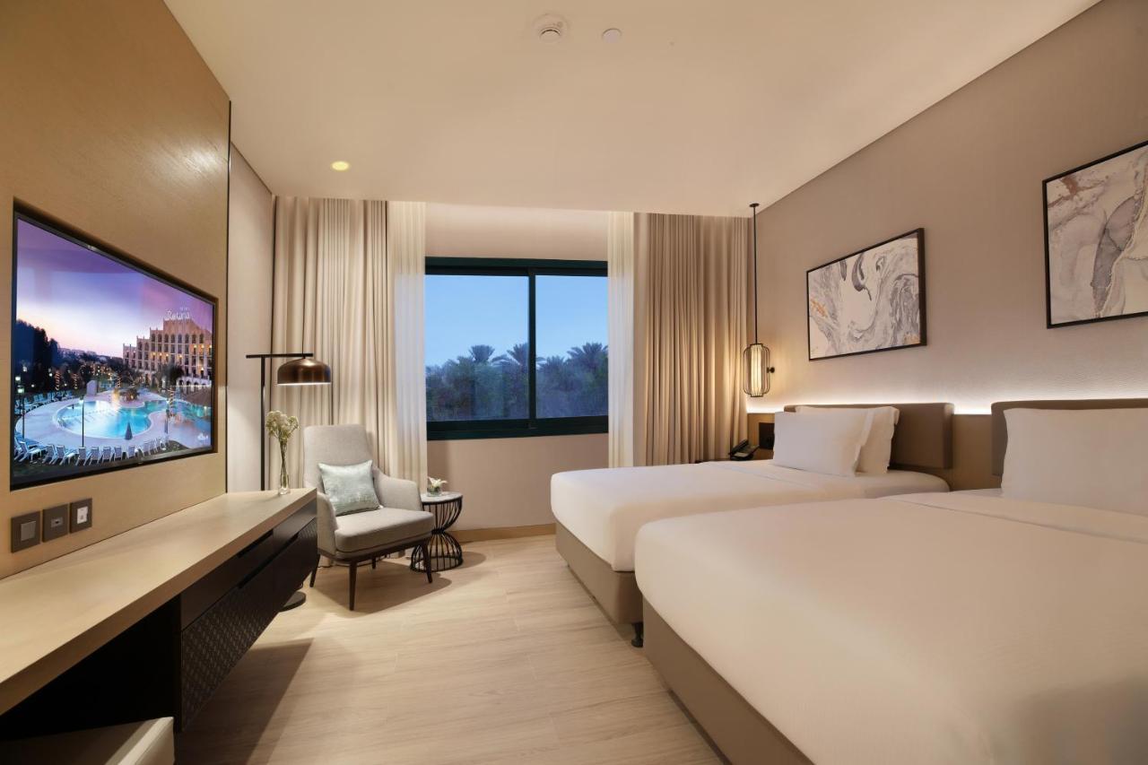 Al Ain Rotana Hotel Екстериор снимка Deluxe Room